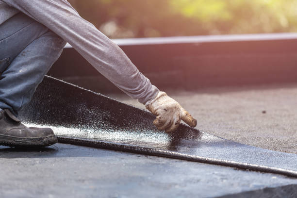 Professional Emergency Waterproofing technician working in Grand Ledge, MI